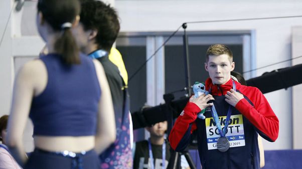 Scott returns to pool after podium controversy Scott returns to pool after podium controversy
