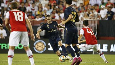 Bale makes goalscoring return as Real edge Arsenal on penalties
