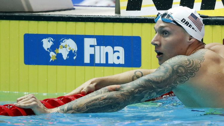 Dressel delivers message with year's fastest 100 free