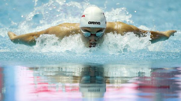 Hungarian teen smashes Phelps record, Peaty does double Hungarian teen smashes Phelps record, Peaty does double