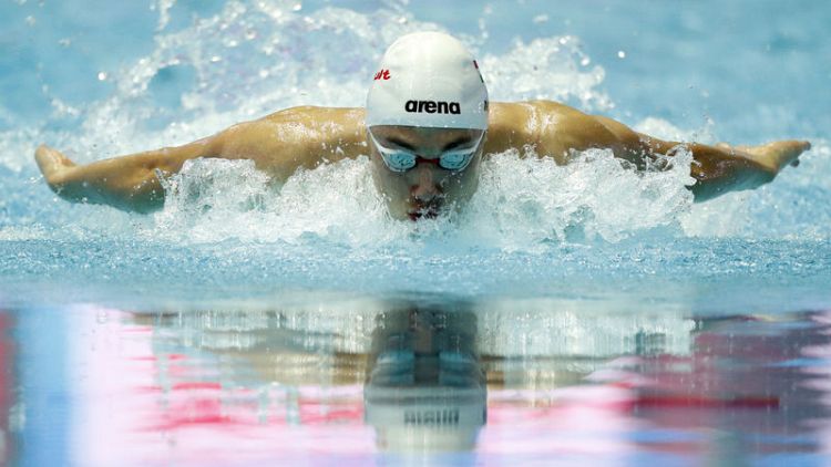Hungarian teen smashes Phelps record, Peaty does double