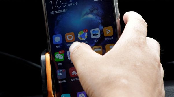 Toyota says to invest $600 million in China's Didi, new joint venture Toyota says to invest $600 million in China's Didi, new joint venture