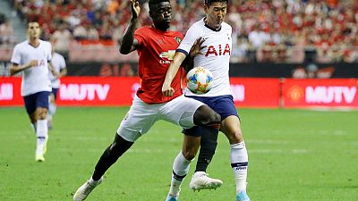 United's late winner against Spurs wraps up perfect tour