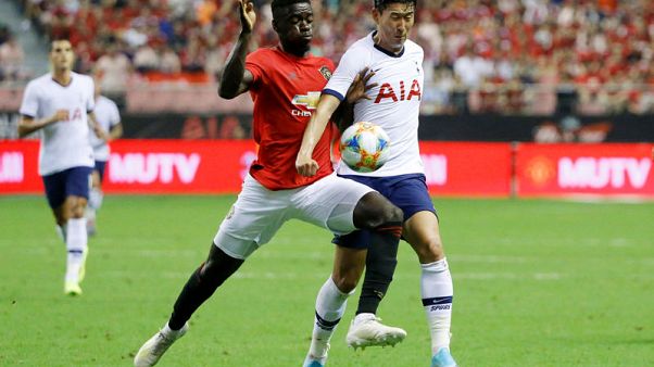 United's late winner against Spurs wraps up perfect tour United's late winner against Spurs wraps up perfect tour