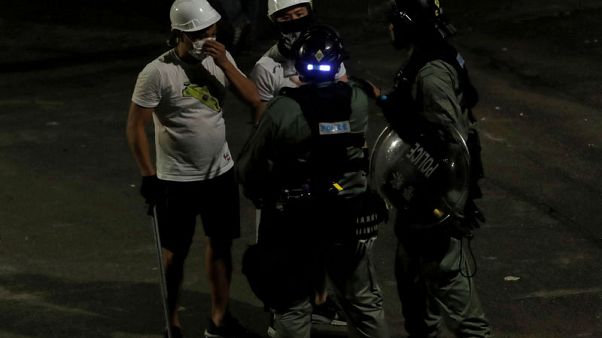 Chinese official urged Hong Kong villagers to drive off protesters before violence at train station Chinese official urged Hong Kong villagers to drive off protesters before violence at train station