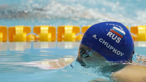Russian Chupkov sets world record in men's 200m breaststroke final Russian Chupkov sets world record in men's 200m breaststroke final