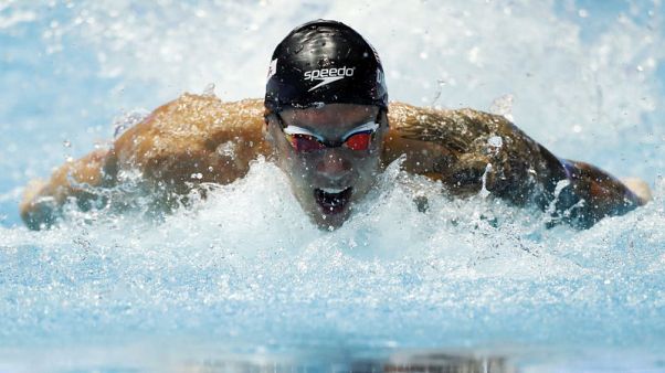 Records tumble as Team USA enjoy huge night at worlds Records tumble as Team USA enjoy huge night at worlds