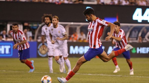 Costa hits four as Atletico smash Real Madrid 7-3 Costa hits four as Atletico smash Real Madrid 7-3