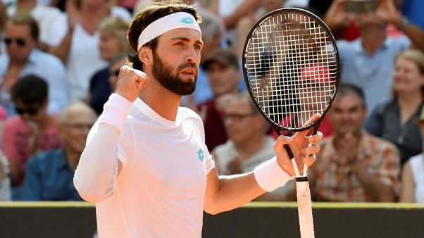 Tennis - Basilashvili battles past Zverev into Hamburg title clash Tennis - Basilashvili battles past Zverev into Hamburg title clash