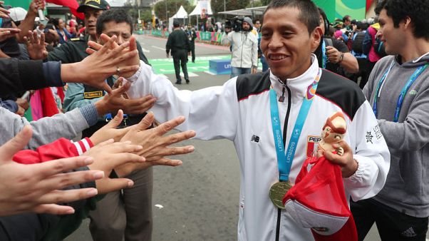 Pacheco win's men's marathon, completes sweep for Peru Pacheco win's men's marathon, completes sweep for Peru