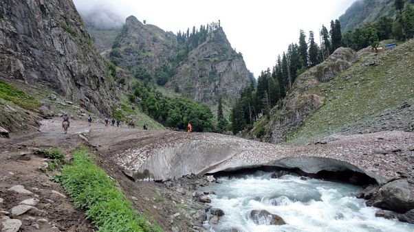India boosts Hindu pilgrimage to holy cave in conflict-torn Kashmir India boosts Hindu pilgrimage to holy cave in conflict-torn Kashmir