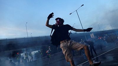 Protesters clash in Hong Kong as cycle of violence intensifies