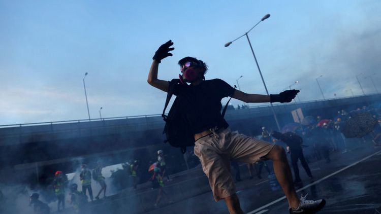 Protesters clash in Hong Kong as cycle of violence intensifies