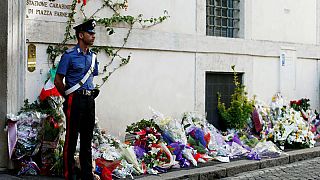 Watch again: Hundreds mourn policeman allegedly murdered by American teenagers in Rome