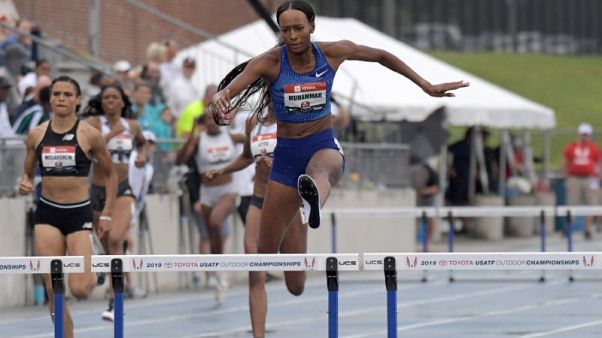 Athletics: Muhammad sets 400m hurdles world record, Lyles wins 200m Athletics: Muhammad sets 400m hurdles world record, Lyles wins 200m