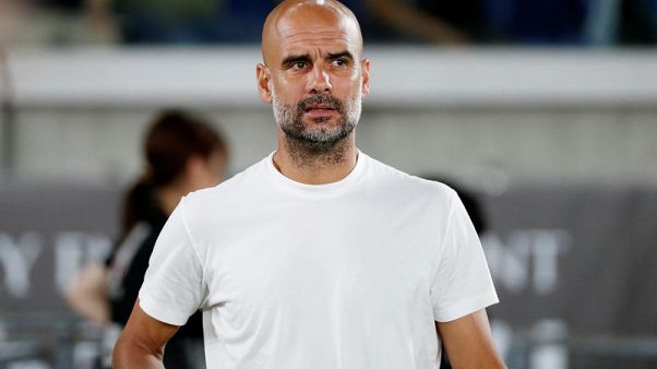 Puma signs partnership with Manchester City manager Guardiola Puma signs partnership with Manchester City manager Guardiola