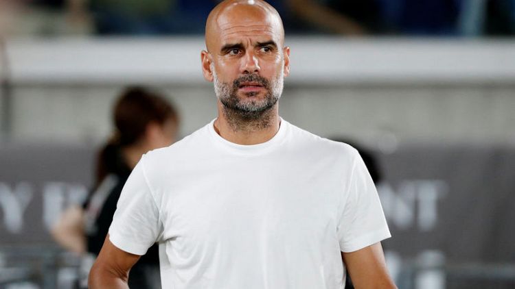 Puma signs partnership with Manchester City manager Guardiola