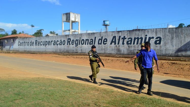 Death toll in Brazil prison massacre rises to 57 with over a dozen decapitated