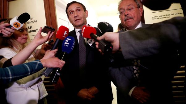 Hungary charges former swimming exec with murder of business rival Hungary charges former swimming exec with murder of business rival