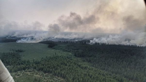 Russians demand vast wildfires consuming Siberia be extinguished Russians demand vast wildfires consuming Siberia be extinguished