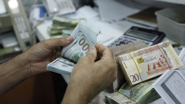 ليبيا تخفض الرسوم على مبيعات العملة الصعبة إلى 163%