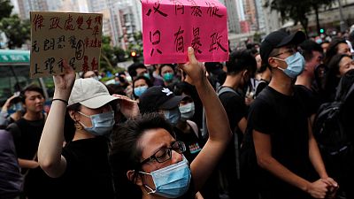 Hong Kong protesters appear in court to face 'riot' charge