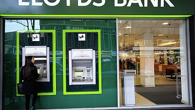 Lloyds Bank hit by 550 million sterling PPI charge, pretax profits fall