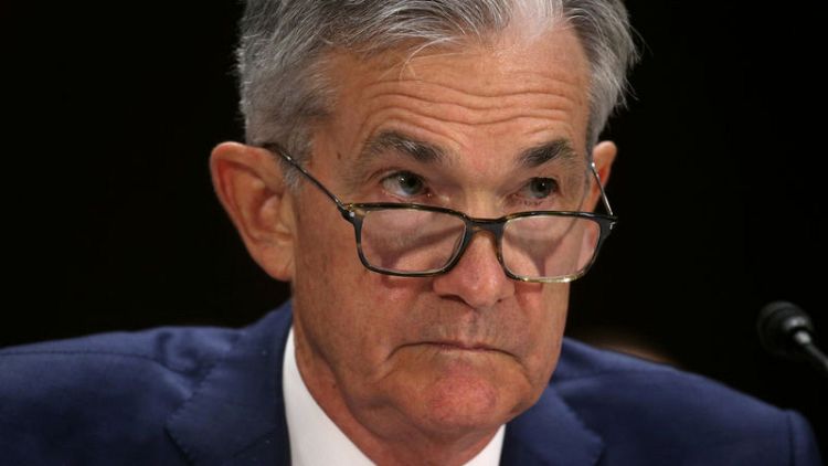 With Fed's 'insurance' cut, Powell takes cue from Greenspan
