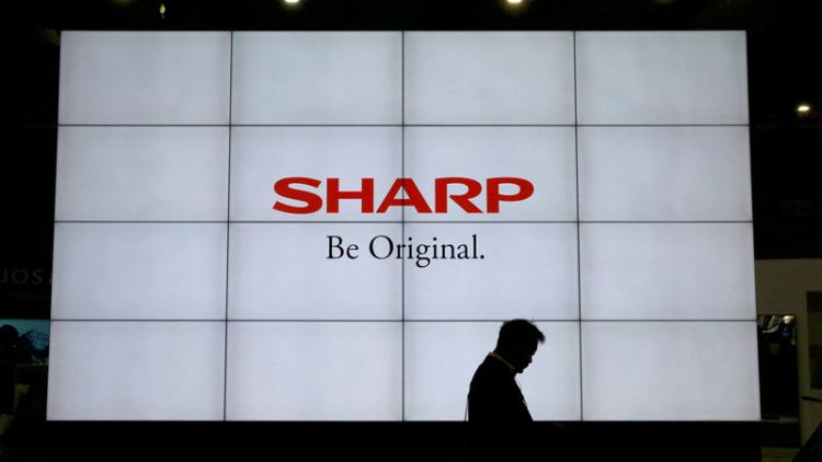 Sharp's first-quarter profit down 41%, below estimates