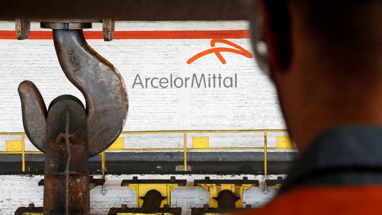 ArcelorMittal cuts steel demand forecast, targets asset sales