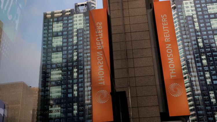 Thomson Reuters sales rise 9%, raises outlook