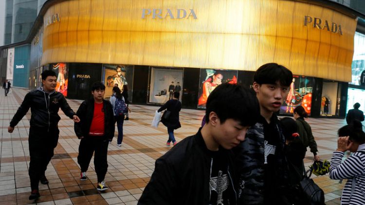 Italy's Prada posts slight increase in first half sales