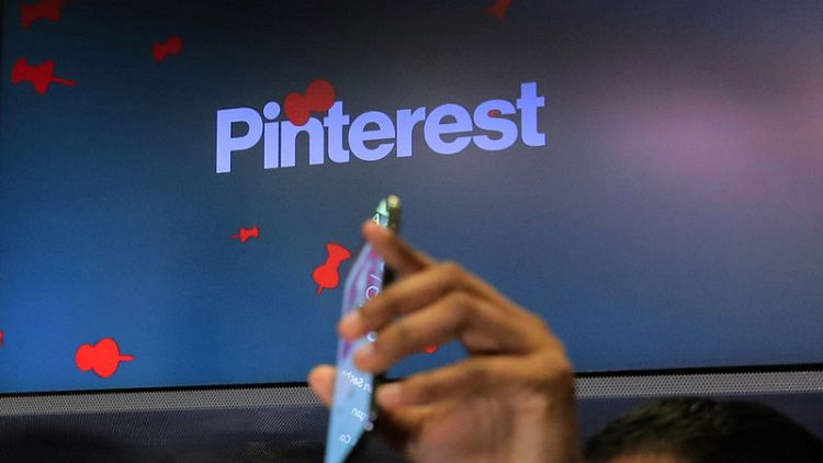 Pinterest beats revenue estimates on user addition, shares jump