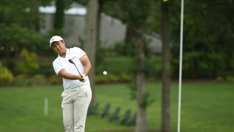 Golf: An's 'okay' 65 earns him halfway lead at Wyndham Championship