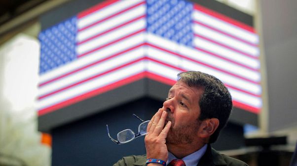 Trade worries sink stocks as yuan slides to a decade low Trade worries sink stocks as yuan slides to a decade low