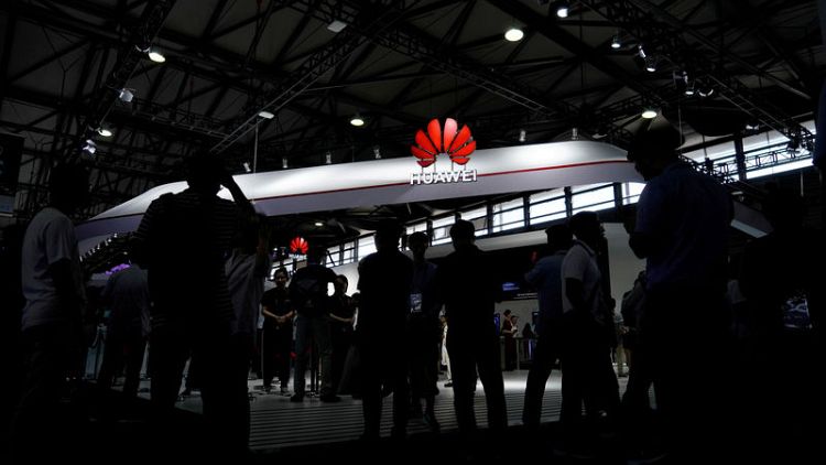 Exclusive: China warns India of 'reverse sanctions' if Huawei is blocked - sources