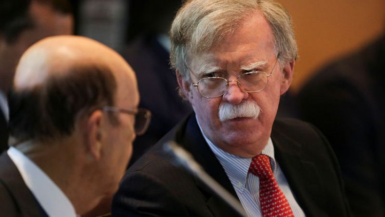 Bolton reminds Kim of missile pledge after North Korea warns of 'new road'