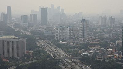 Indonesia's capital curbs private cars in bid to cut choking pollution Indonesia's capital curbs private cars in bid to cut choking pollution