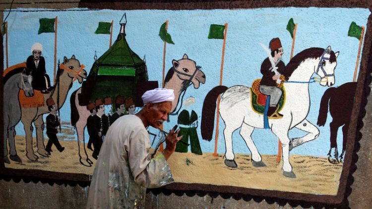 Egyptian artist paints murals on houses to celebrate haj