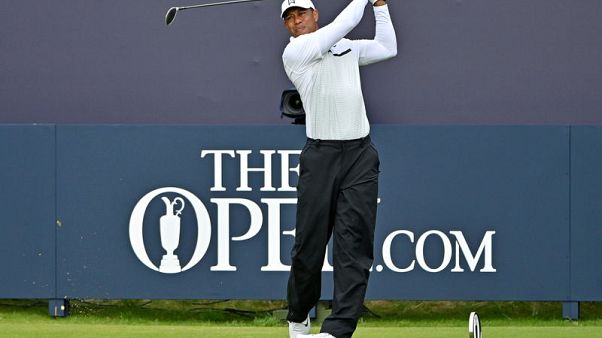 Tiger battling back stiffness ahead of playoff opener Tiger battling back stiffness ahead of playoff opener