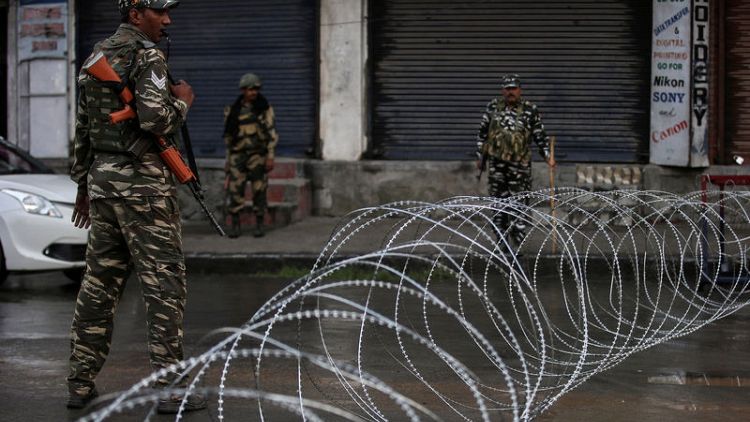 India urges Pakistan to restore diplomatic ties, keeps lid on Kashmir