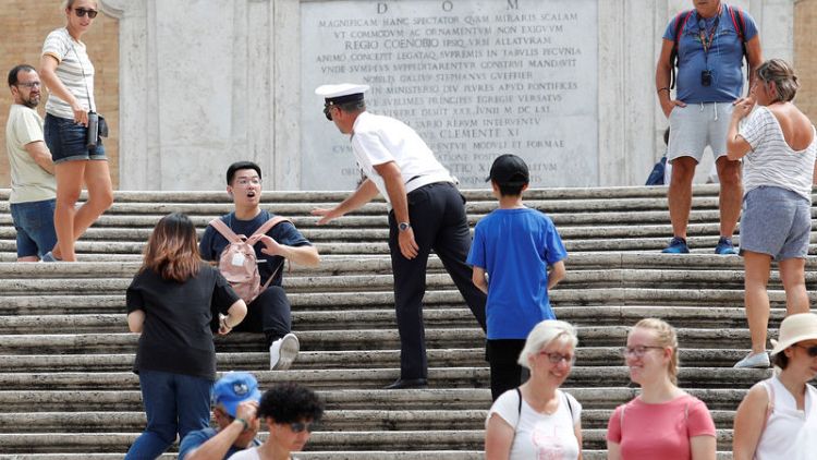 Rome bans sitting on Spanish Steps, puzzling hot, tired tourists