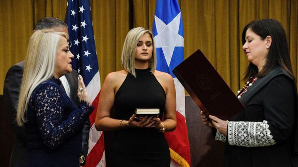 Puerto Rico's new governor says she intends to remain in office Puerto Rico's new governor says she intends to remain in office