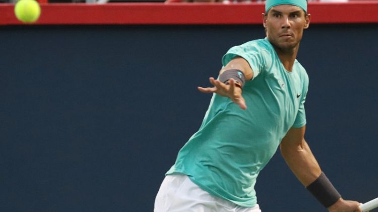 Nadal tames wind and Pella to cruise to Rogers Cup quarters
