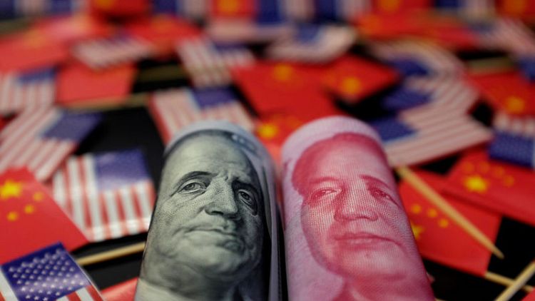 China lowers yuan mid-point to fresh 11-year low, but higher than forecasts