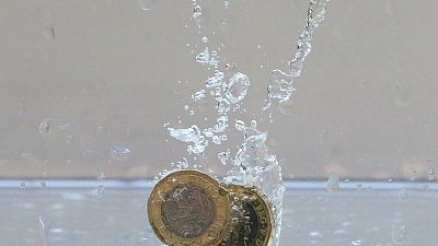 Sterling, UK stocks drop after surprise second-quarter contraction Sterling, UK stocks drop after surprise second-quarter contraction