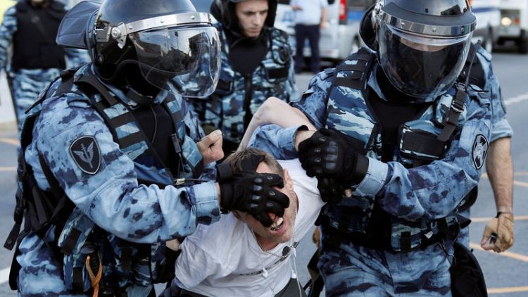 Russian protesters hurt in police crackdown seek redress in courts