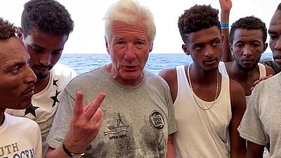 Hollywood star Gere visits stranded migrants on Open Arms ship Hollywood star Gere visits stranded migrants on Open Arms ship