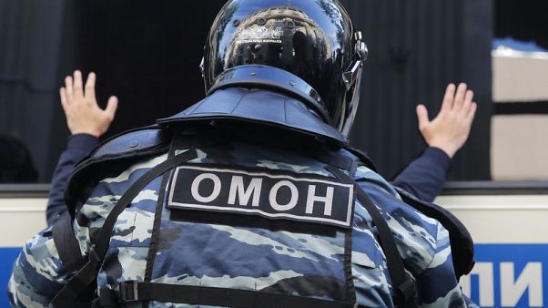 Police detain Russian opposition politician ahead of protest Police detain Russian opposition politician ahead of protest