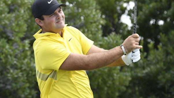 Reed takes Northern Trust lead, Johnson struggles Reed takes Northern Trust lead, Johnson struggles